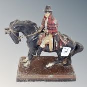 An antique hand painted metal figure of Dick Turpin.