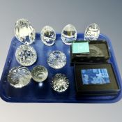 A tray containing 11 crystal paperweights including Arribas crystal impressions etc.