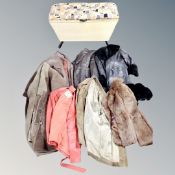 A mid century loom blanket box on raised legs together with seven vintage fur,