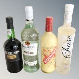 Four bottles of alcohol including Cockburn's port, Bacardi, Chase Rubarb vodka and Advocaat.