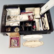 A box containing a quantity of costume jewellery, Lotus pearls, jewellery boxes, running medal,