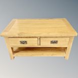 Oakland Furniture : A contemporary oak two tier twin-sided coffee table fitted drawers,