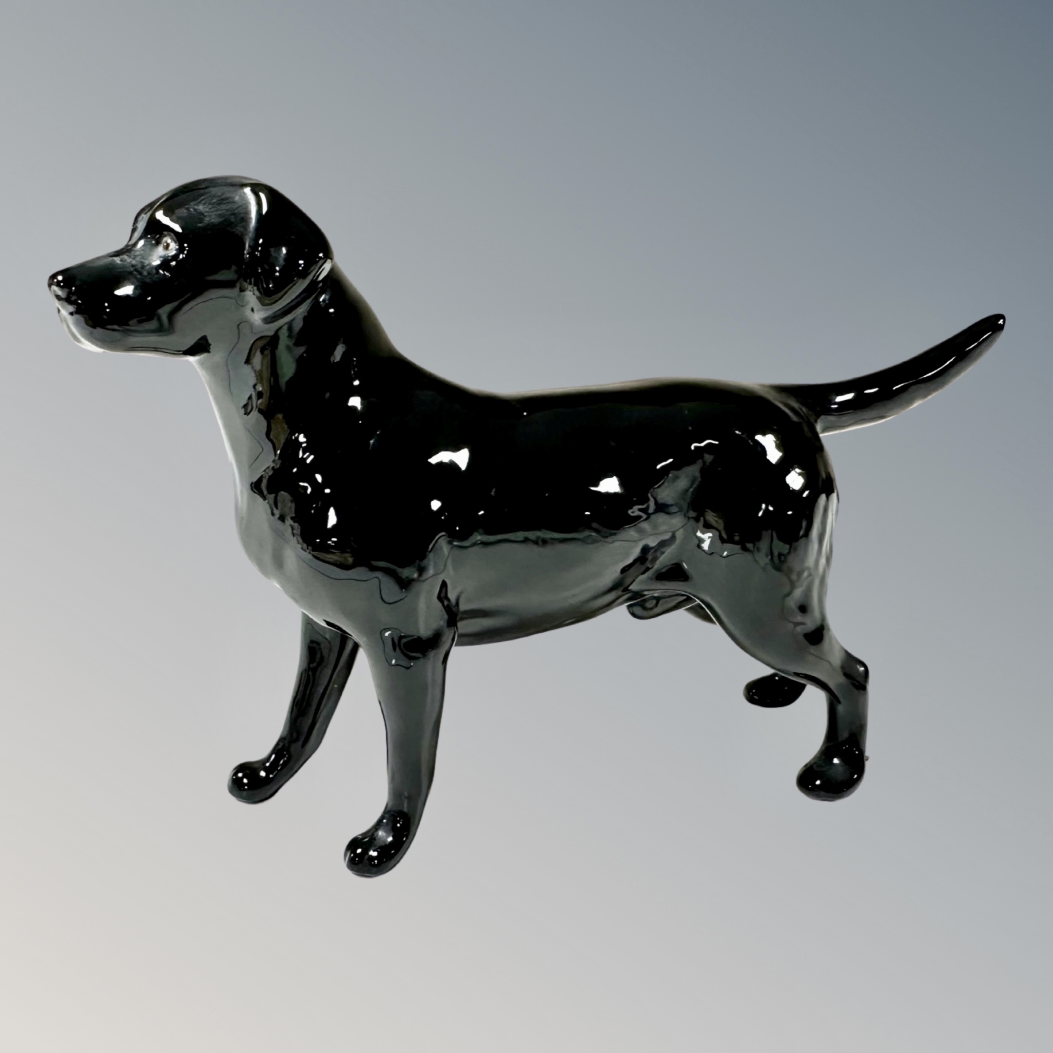 A Beswick Black Labrador Retriever.