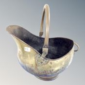 A Victorian brass swing handled coal bucket.