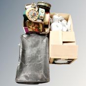 A vintage case together with three boxes containing tins and Crown Ming dinnerware.