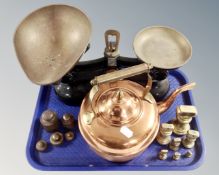 A tray containing a copper and brass kettle together with a set of antique kitchen scales and two