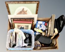 A box containing place mats, binoculars, bellows, pictures, Scalextrics car, CDs etc.