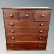 A Victorian seven drawer chest,
