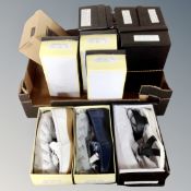 A box containing 11 pairs of lady's Cushion Walk shoes, boxed.