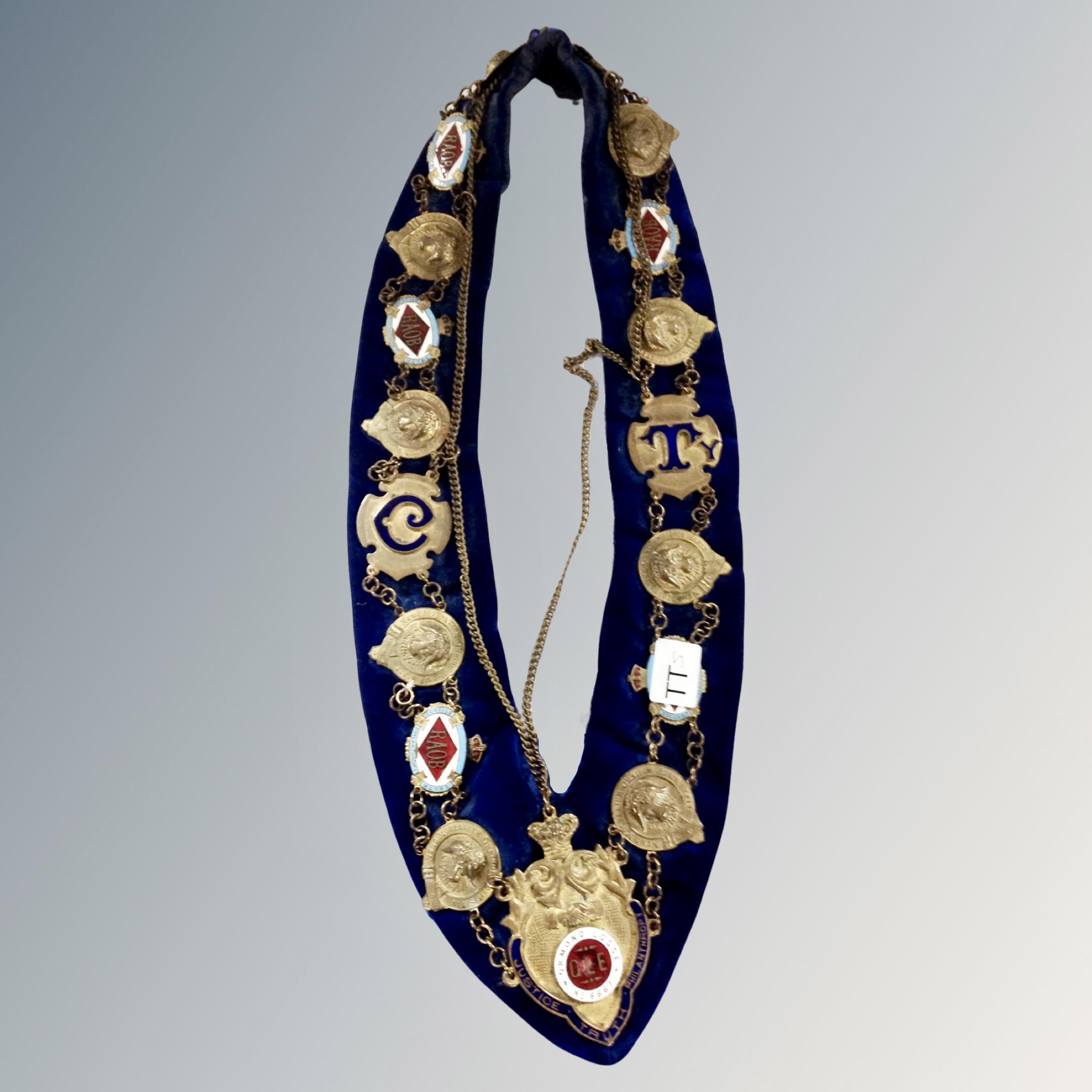 A Masonic sash with medals, Ormond Lodge.