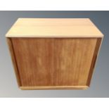 A teak double door low cabinet,