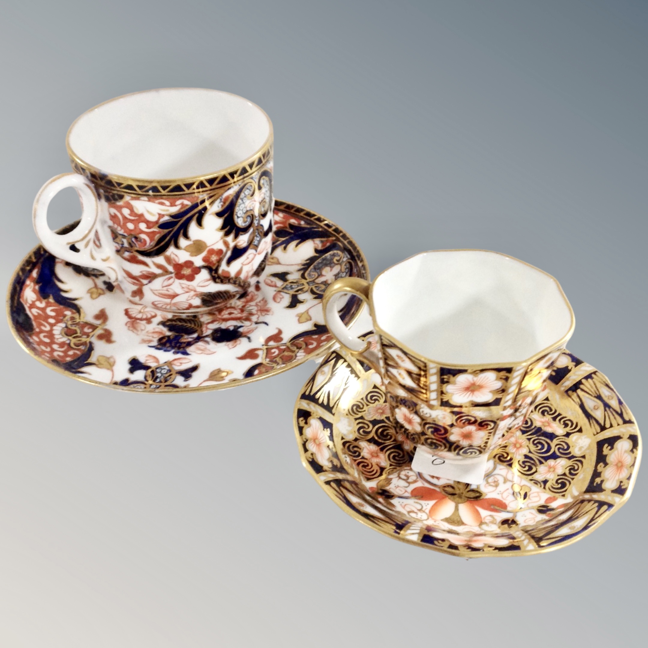 A 20th century Royal Crown Derby Imari teacup and saucer together with a further 19th century
