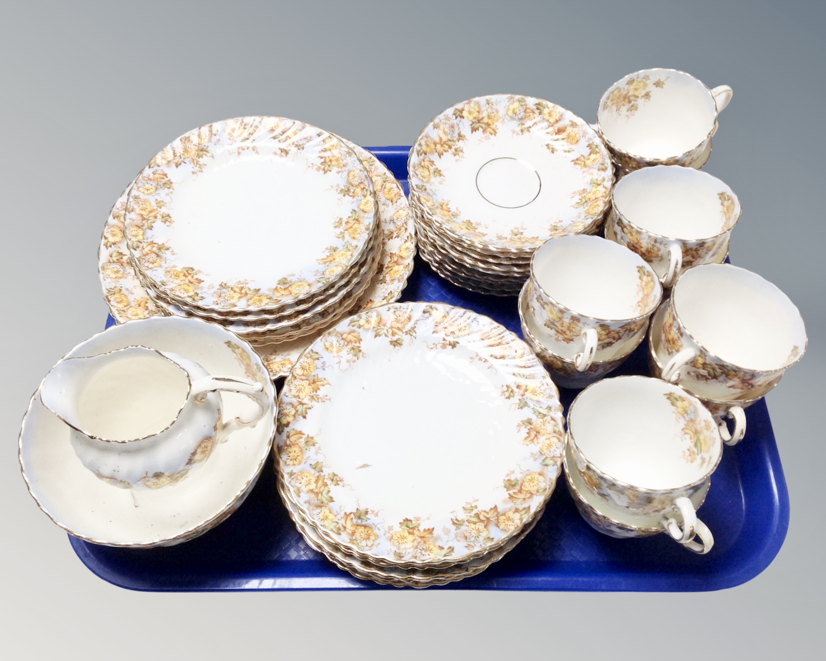 A collection 36 pieces of antique Robinson Severn floral pattern gilt rimmed tea china.