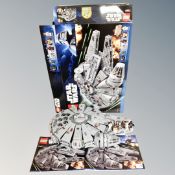 A Lego Star Wars 7965 Millenium Falcon, with box and instructions.