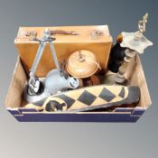 A box containing a vintage leather luggage case, 20th century angle poise lamp,