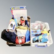 A box and a crate containing a fire extinguisher, air compressors, jump leads, batter charger,