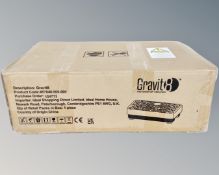 A Gravit8 vibration plate, boxed and new.