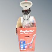 A Rug Doctor deep carpet cleaner with box