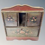 A hand painted countertop fall front cabinet fitted with two cupboards.