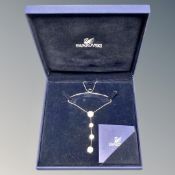 A Swarovski crystal drop pendant, in original retail box.