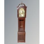 A Tempus Fugit longcase clock.