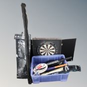 A collection of sporting equipment including a cricket set, dartboard, rugby ball, fishing rod etc.