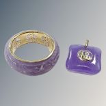A 14ct yellow gold QVC band ring together with matching pendant.