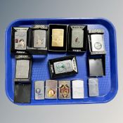 A collection of Zippo lighters.