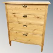 A pine four drawer chest.