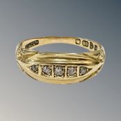 An 18ct yellow gold five stone diamond ring, size L, 3.6g.