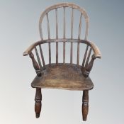 A 19th century child's Windsor armchair.