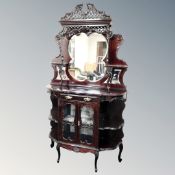 An ornate late Victorian mahogany mirror backed chiffoniere.