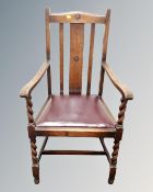 An oak barley twist armchair.