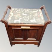 A late Victorian mahogany and beech storage piano stool.