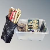 A box containing assorted Christmas decorations storage box and a bag containing a large quantity