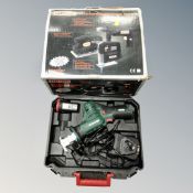 A three piece combination power tool kit, together with a cordless handsaw.