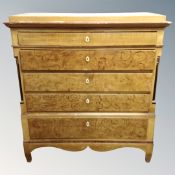 A 19th century five drawer chest in a scumbled finish.