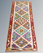 A Chobi kilim runner 161cm by 65cm