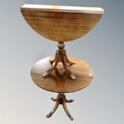 A pair of Strongbow Furniture mahogany flap sided occasional tables with brass capped feet.