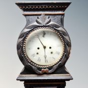 A Scandinavian painted longcase clock with circular dial, pendulum and weights.