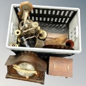 A crate containing antique and later metal wares including candlesticks, an oil lamp base,