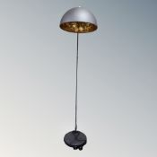A contemporary over chair floor lamp.