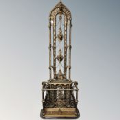 A Victorian style ornate cast iron hall stand.