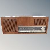 A mid-20th century teak cased Loewe Opta radio.