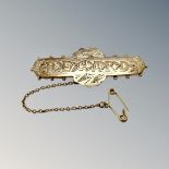 A 9ct yellow gold 'Regard' bar brooch, 3g.