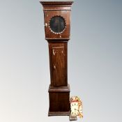 A Scandinavian painted longcase clock with hand painted dial (AF), pendulum and weights.