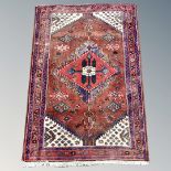 A Hamadan rug, North West Iran, 157cm by 112cm.