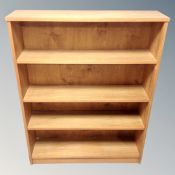 A set of mid-20th century Danish bookshelves in a teak finish.