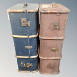 Two vintage wooden bound shipping trunks.