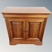 An Ernest Menard double door cabinet fitted with a drawer.